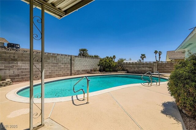 7704 Peacock Ave, Las Vegas, NV 89145 - view of pool featuring a patio and a fenced backyard