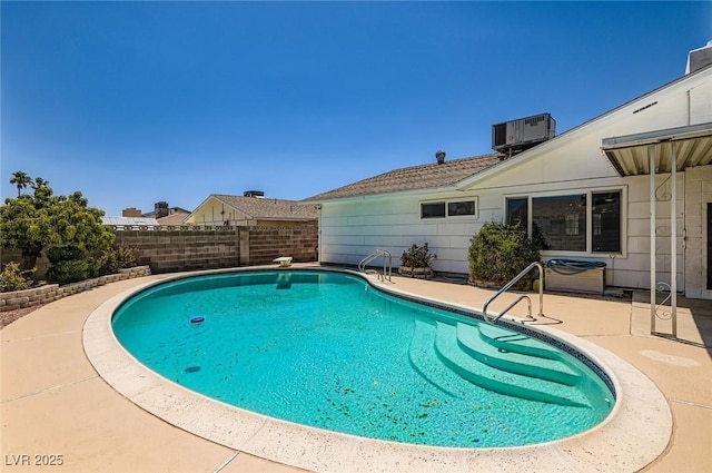 7704 Peacock Ave, Las Vegas, NV 89145 - view of swimming pool with a patio area and a fenced backyard