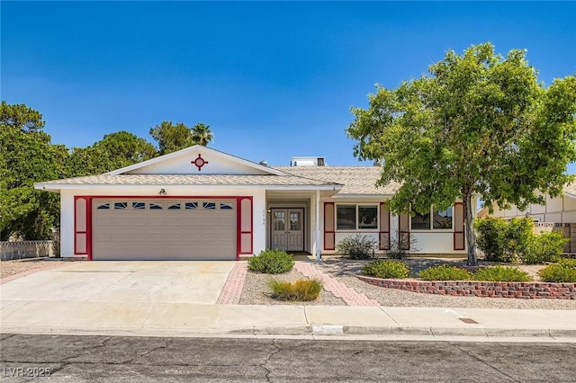 7704 Peacock Ave, Las Vegas, NV 89145 - single story home with driveway, a garage, and stucco siding