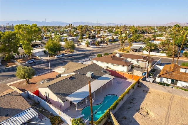 1571 Pawnee Dr, Las Vegas, NV 89169 - aerial perspective of suburban area featuring a mountainous background