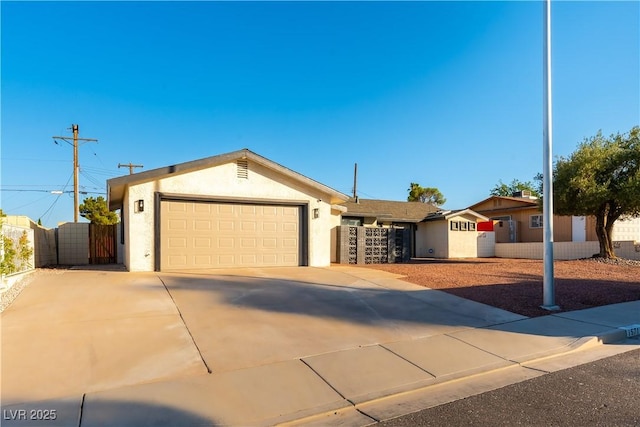 1571 Pawnee Dr, Las Vegas, NV 89169 - single story home featuring stucco siding, a garage, driveway, and a gate
