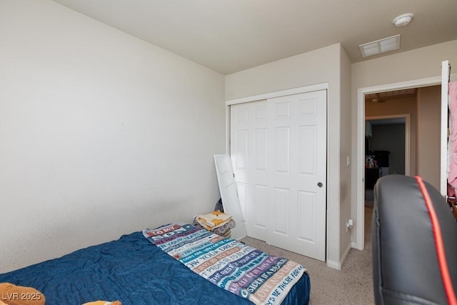 7212 Sunray Point St, North Las Vegas, NV 89084 - carpeted bedroom featuring a closet and baseboards