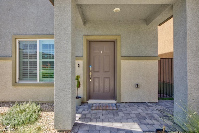7212 Sunray Point St, North Las Vegas, NV 89084 - view of exterior entry with stucco siding