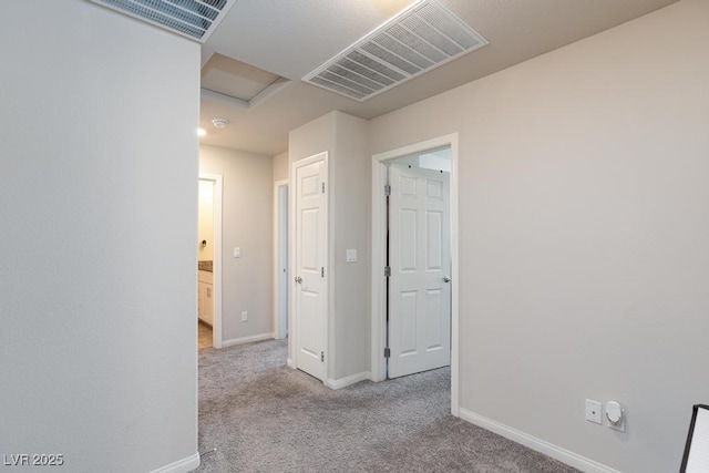 7212 Sunray Point St, North Las Vegas, NV 89084 - hallway with carpet and baseboards
