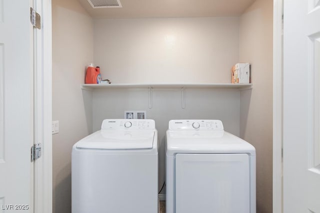 7212 Sunray Point St, North Las Vegas, NV 89084 - laundry room with washing machine and clothes dryer
