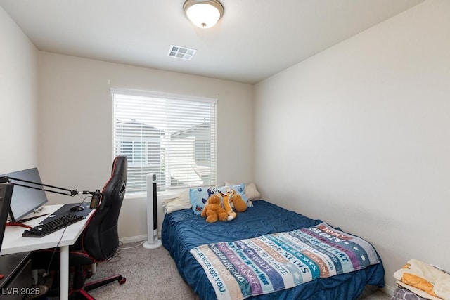 7212 Sunray Point St, North Las Vegas, NV 89084 - carpeted bedroom with a desk and baseboards