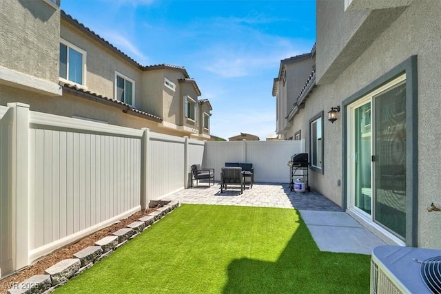 7226 N Decatur Blvd Unit 4, Las Vegas, NV 89131 - fenced backyard featuring a patio area