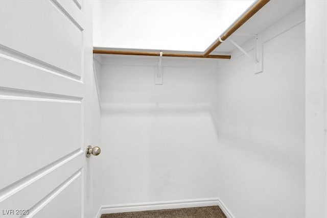 7226 N Decatur Blvd Unit 4, Las Vegas, NV 89131 - walk in closet featuring carpet floors