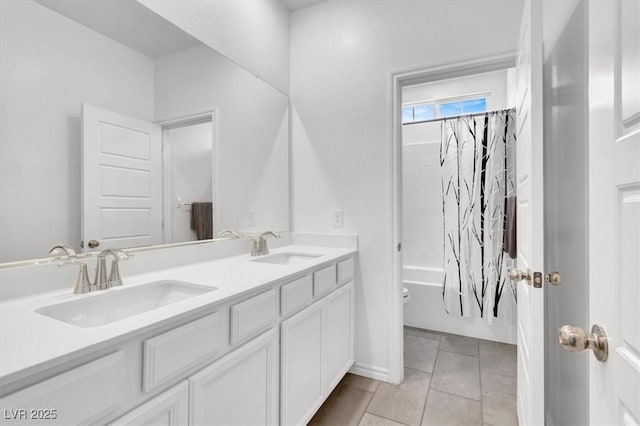 7226 N Decatur Blvd Unit 4, Las Vegas, NV 89131 - bathroom featuring double vanity, shower / bath combo with shower curtain, and tile patterned flooring