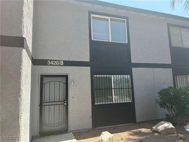 3420 Mercury St Unit B, North Las Vegas, NV 89030 - entrance to property featuring stucco siding