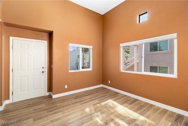 1948 Las Palmas Ln Unit 277, Laughlin, NV 89029 - foyer with wood finished floors, a high ceiling, and plenty of natural light