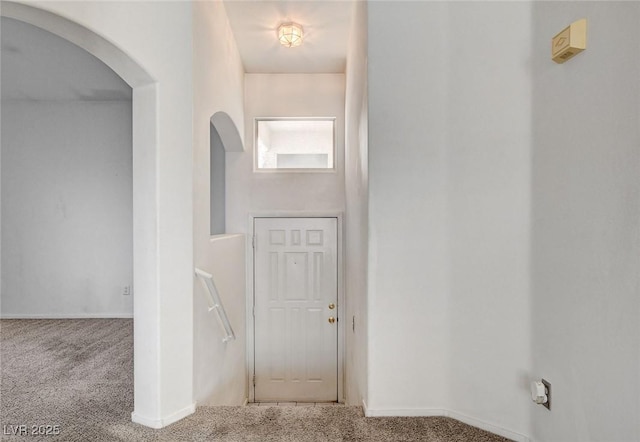 6201 E Lake Mead Blvd Unit 223, Las Vegas, NV 89156 - hallway featuring carpet floors and arched walkways