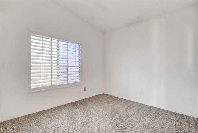 6201 E Lake Mead Blvd Unit 223, Las Vegas, NV 89156 - empty room featuring carpet floors and lofted ceiling