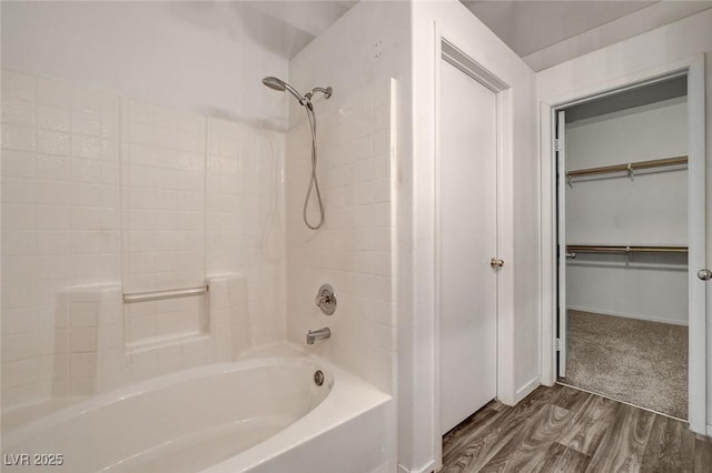 6201 E Lake Mead Blvd Unit 223, Las Vegas, NV 89156 - bathroom with wood finished floors, shower / bath combination, and a spacious closet