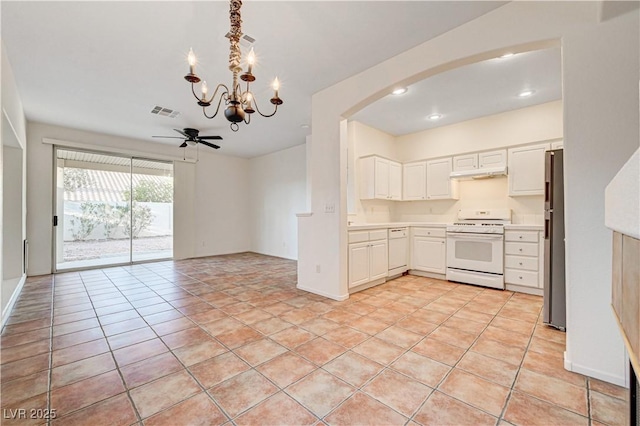 10612 Primrose Arbor Ave, Las Vegas, NV 89144 - kitchen with white appliances, a chandelier, arched walkways, light countertops, and recessed lighting