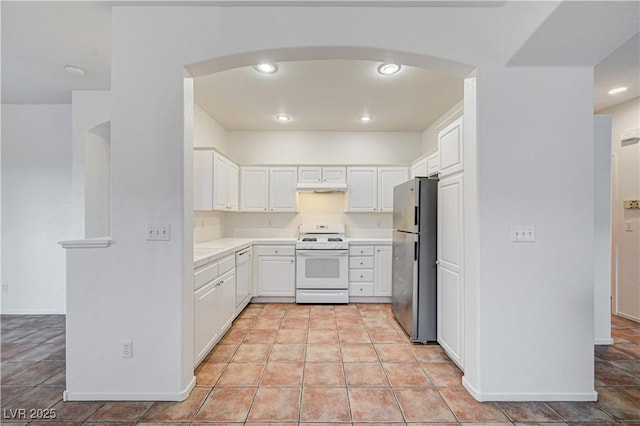 10612 Primrose Arbor Ave, Las Vegas, NV 89144 - kitchen with white appliances, white cabinetry, light countertops, arched walkways, and recessed lighting