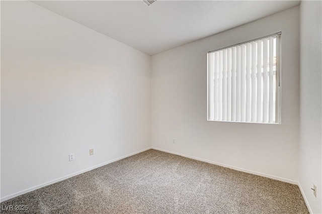 10612 Primrose Arbor Ave, Las Vegas, NV 89144 - carpeted spare room with baseboards