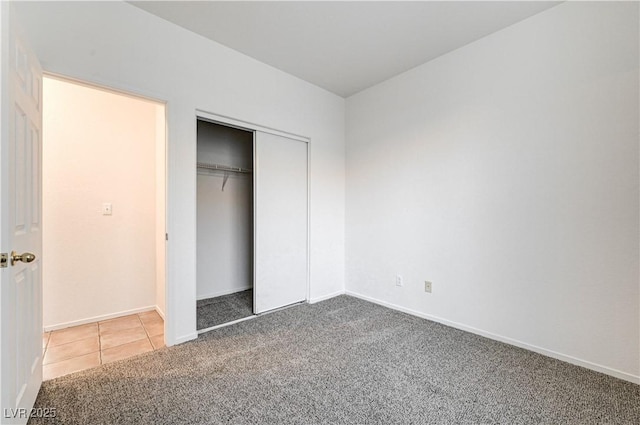 10612 Primrose Arbor Ave, Las Vegas, NV 89144 - unfurnished bedroom with carpet flooring and a closet