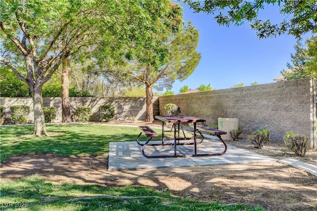 10612 Primrose Arbor Ave, Las Vegas, NV 89144 - fenced backyard featuring a patio area