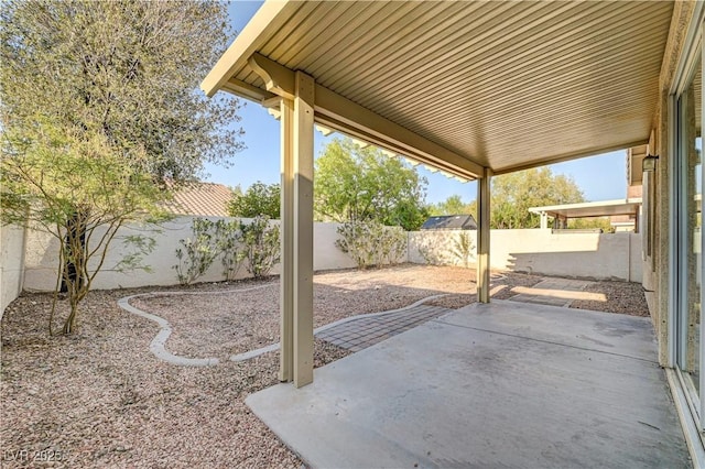 10612 Primrose Arbor Ave, Las Vegas, NV 89144 - fenced backyard with a patio