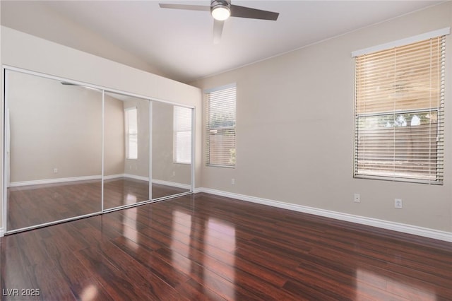 757 Roddenberry Ave, Las Vegas, NV 89123 - unfurnished bedroom featuring wood finished floors, a closet, vaulted ceiling, and a ceiling fan