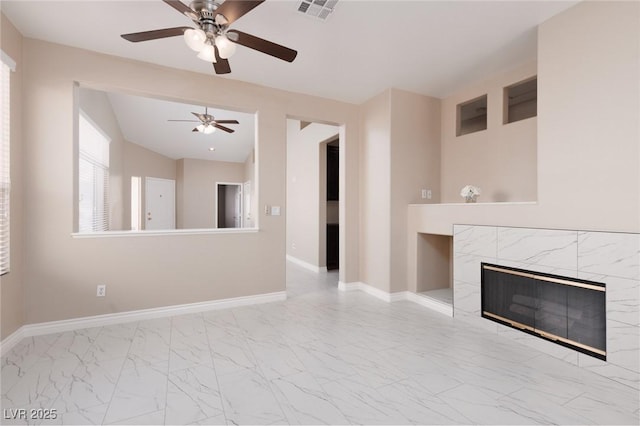 757 Roddenberry Ave, Las Vegas, NV 89123 - unfurnished living room with a ceiling fan, marble finish floors, and a tiled fireplace