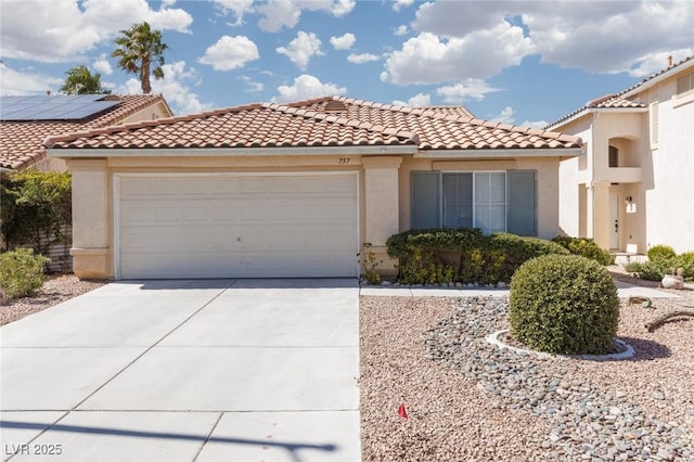 757 Roddenberry Ave, Las Vegas, NV 89123 - mediterranean / spanish home featuring a tiled roof, stucco siding, concrete driveway, and an attached garage