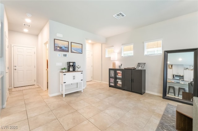 9237 Brayden Bay St, Las Vegas, NV 89178 - living area featuring light tile patterned floors and recessed lighting