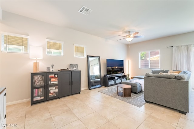 9237 Brayden Bay St, Las Vegas, NV 89178 - living room with a ceiling fan and light tile patterned floors