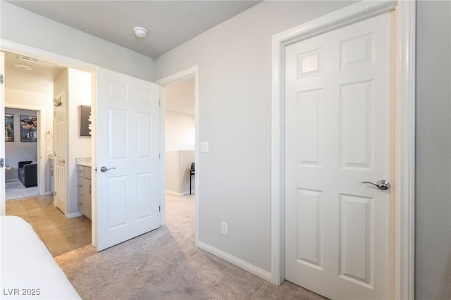 9237 Brayden Bay St, Las Vegas, NV 89178 - unfurnished bedroom featuring light colored carpet and baseboards