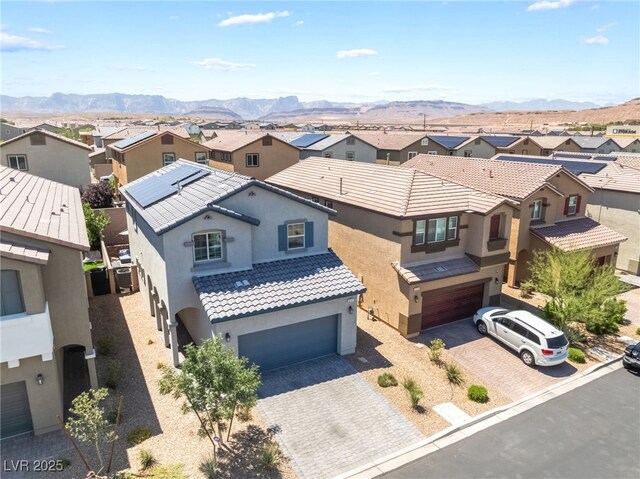 9237 Brayden Bay St, Las Vegas, NV 89178 - aerial perspective of suburban area with a mountainous background