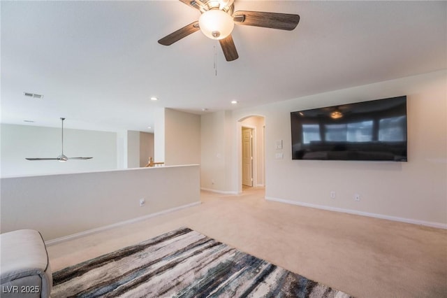 8929 Glenistar Gate Ave, Las Vegas, NV 89143 - unfurnished living room with ceiling fan, arched walkways, carpet, and recessed lighting