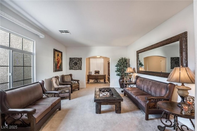 8929 Glenistar Gate Ave, Las Vegas, NV 89143 - carpeted living area featuring arched walkways