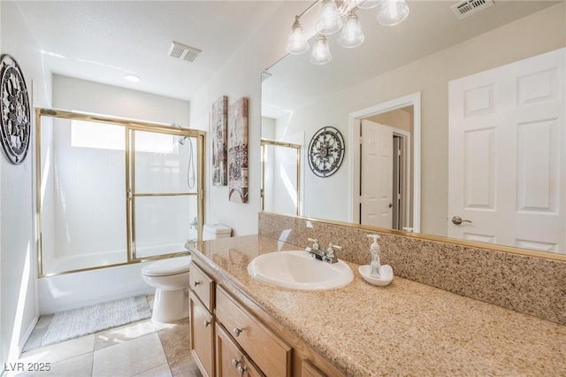 8929 Glenistar Gate Ave, Las Vegas, NV 89143 - full bathroom featuring vanity, shower / bath combination with glass door, and tile patterned flooring
