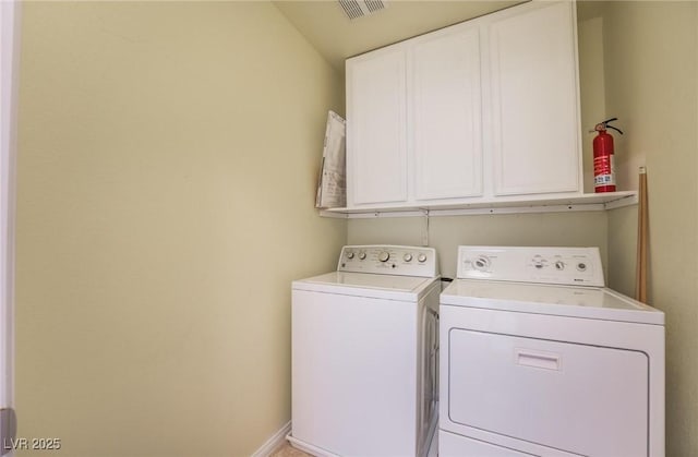8929 Glenistar Gate Ave, Las Vegas, NV 89143 - laundry area with separate washer and dryer and cabinet space