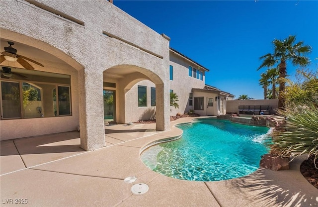 8929 Glenistar Gate Ave, Las Vegas, NV 89143 - view of swimming pool with a patio area, ceiling fan, and a pool with connected hot tub