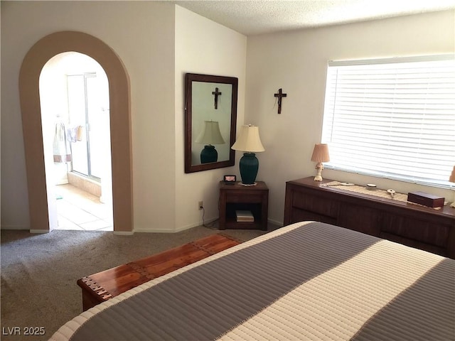 4816 Fiesta Lakes St, Las Vegas, NV 89130 - carpeted bedroom featuring arched walkways and baseboards