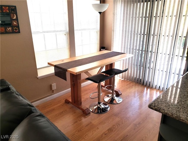 4816 Fiesta Lakes St, Las Vegas, NV 89130 - dining area featuring wood finished floors and baseboards