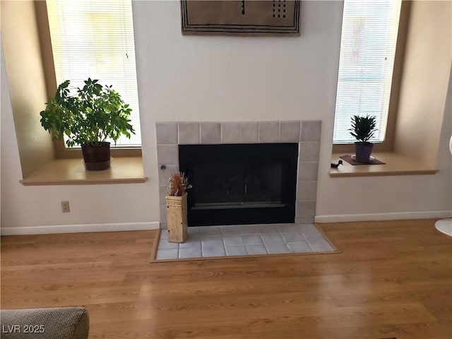 4816 Fiesta Lakes St, Las Vegas, NV 89130 - detailed view of wood finished floors and a tile fireplace