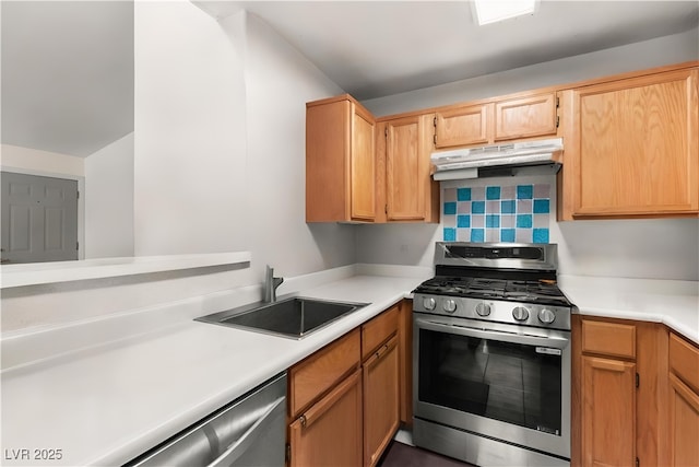 350 S Durango Dr Unit 202, Las Vegas, NV 89145 - kitchen with stainless steel appliances, under cabinet range hood, light countertops, and tasteful backsplash