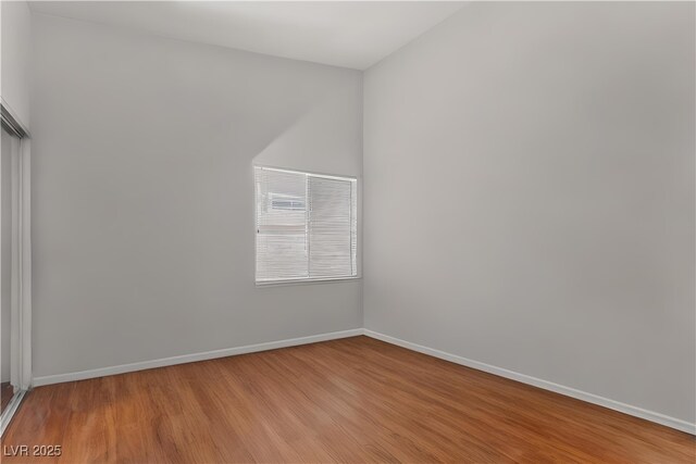 350 S Durango Dr Unit 202, Las Vegas, NV 89145 - bonus room featuring wood finished floors and baseboards