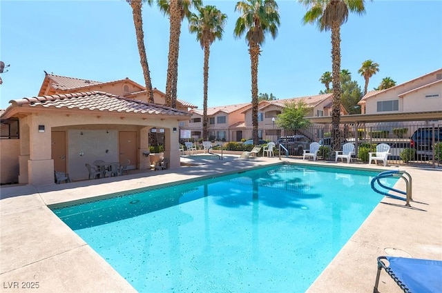 350 S Durango Dr Unit 202, Las Vegas, NV 89145 - community pool featuring a patio and a residential view