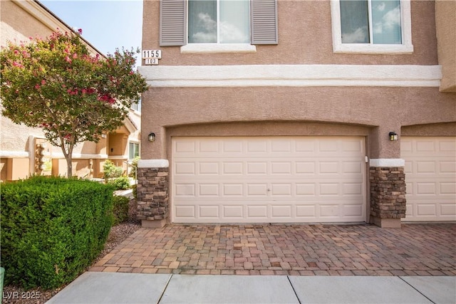 1155 Heavenly Harvest Pl Unit 3, Henderson, NV 89002 - garage with decorative driveway