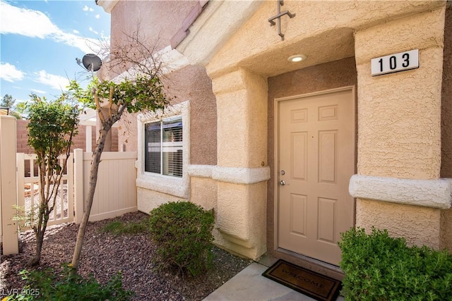 1155 Heavenly Harvest Pl Unit 3, Henderson, NV 89002 - doorway to property featuring stucco siding