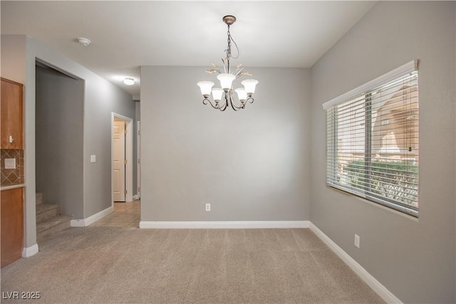 1155 Heavenly Harvest Pl Unit 3, Henderson, NV 89002 - empty room with a chandelier and light carpet