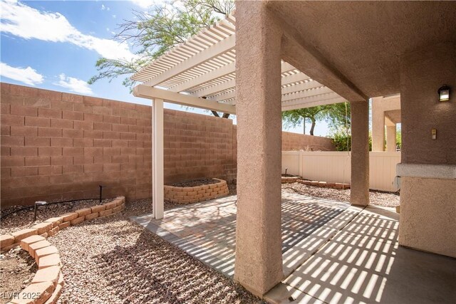 1155 Heavenly Harvest Pl Unit 3, Henderson, NV 89002 - fenced backyard featuring a patio and a pergola