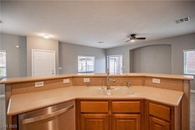 1155 Heavenly Harvest Pl Unit 3, Henderson, NV 89002 - kitchen with dishwasher, light countertops, ceiling fan, carpet floors, and open floor plan