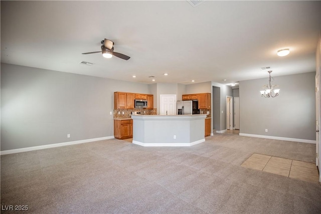 1155 Heavenly Harvest Pl Unit 3, Henderson, NV 89002 - unfurnished living room featuring a chandelier, a ceiling fan, light carpet, and recessed lighting