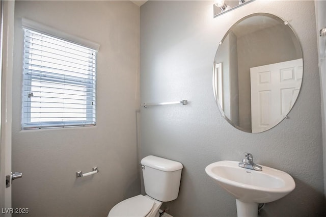 1155 Heavenly Harvest Pl Unit 3, Henderson, NV 89002 - half bathroom featuring toilet and a sink