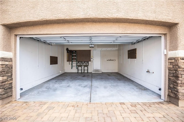 1155 Heavenly Harvest Pl Unit 3, Henderson, NV 89002 - garage featuring a garage door opener